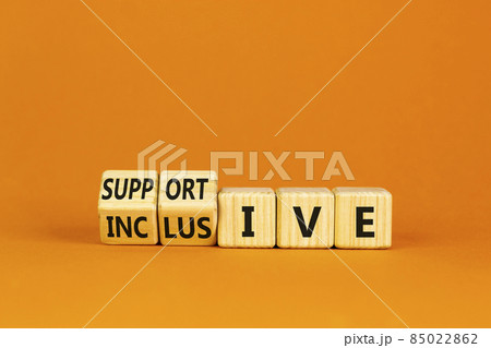 Supportive and inclusive symbol. Turned cubes and changed words 'supportive' to 'inclusive'. Beautiful orange background, copy space. Business, supportive and inclusive concept. Supportive and inclusive symbol. Turned cubes and changed words 'supportive' to 'inclusive'. Beautiful orange background, copy space. Business, supportive and inclusive concept. 85022862