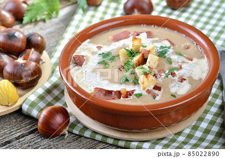 Delicious chestnut soup with celery, croutons and roasted bacon from South Tyrol Delicious chestnut soup with celery, croutons and roasted bacon from South Tyrol 85022890