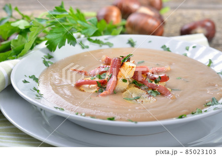 Delicious chestnut soup with celery and croutons Delicious chestnut soup with celery and croutons 85023103