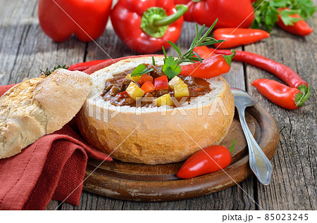 Hot Hungarian goulash soup in a loaf Hot Hungarian goulash soup in a loaf 85023245