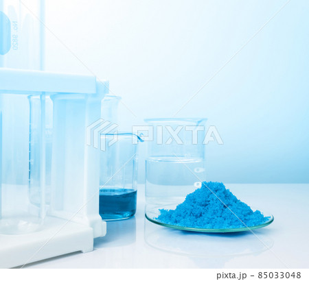 Closeup inorganic chemical on white laboratory table. Copper(II) sulfate, alcohol. Chemical ingredient for Cosmetics and Toiletries product. Closeup inorganic chemical on white laboratory table. Copper(II) sulfate, alcohol. Chemical ingredient for Cosmetics and Toiletries product. 85033048
