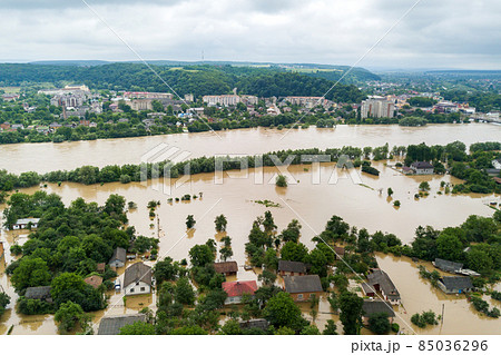 Aerial view of flooded houses with dirty water of Dnister river in Halych town, western Ukraine. 85036296