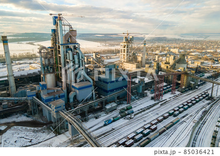 Aerial view of cement plant with high factory structure at industrial production area. 85036421