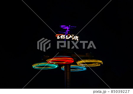 Kouvola, Finland - 28 August 2021: Rotating ride Taifun in amusement park Tykkimaki at night 85039227