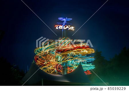 Kouvola, Finland - 28 August 2021: Rotating ride Taifun in amusement park Tykkimaki at night 85039229