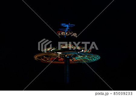 Kouvola, Finland - 28 August 2021: Rotating ride Taifun in amusement park Tykkimaki at night Kouvola, Finland - 28 August 2021: Rotating ride Taifun in amusement park Tykkimaki at night 85039233