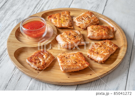 Fried salmon with sauce Fried salmon with sauce 85041272
