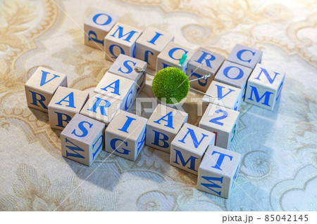 Omicron. Natural wood cubes with blue letters 85042145
