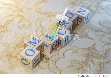 Omicron. Natural wood cubes with blue letters 85042152