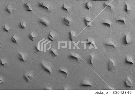 Loft-style plaster walls, gray, white, empty space used as wallpaper. Popular in home design or interior design. with copy spaces. Loft-style plaster walls, gray, white, empty space used as wallpaper. Popular in home design or interior design. with copy spaces. 85042349