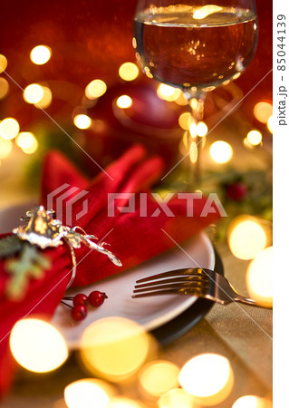 Traditional Christmas table place setting. Holidays background. Traditional Christmas table place setting. Holidays background. 85044139
