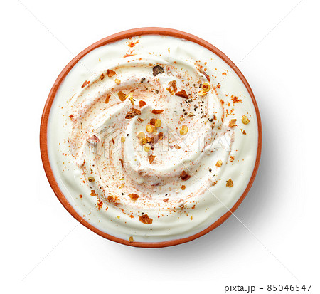 bowl of hot dip yogurt sauce 85046547