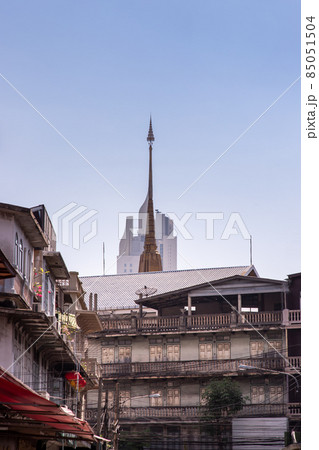 City view of Bangkok with House and Modern tall building and Thai temple that perfectly coexist. City view of Bangkok with House and Modern tall building and Thai temple that perfectly coexist. 85051504