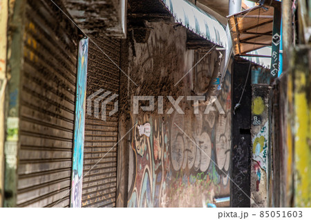 The closed shop in Alley at Khao San Road on daytime without people. COVID-19 outbreak situation The closed shop in Alley at Khao San Road on daytime without people. COVID-19 outbreak situation 85051603