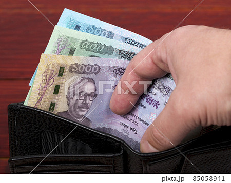 Currency of Bangladesh in the black wallet Currency of Bangladesh in the black wallet 85058941