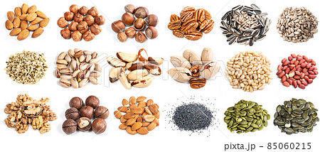 set of various piles of nuts cutout on white 85060215
