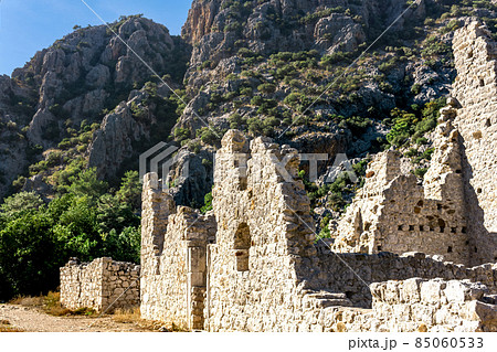 ruins of ancient buildings on the background of mountains in the antique city of Olympos, Turkey 85060533