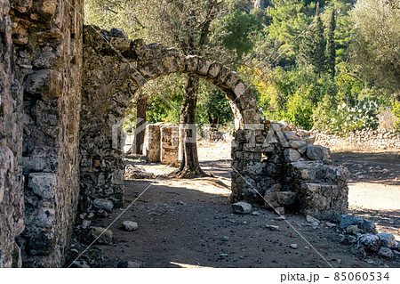 ancient arch in the ruins of the antique city of Olympos in Turkey ancient arch in the ruins of the antique city of Olympos in Turkey 85060534