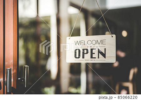 Open sign hanging front of cafe with colorful bokeh light abstract background. 85066220
