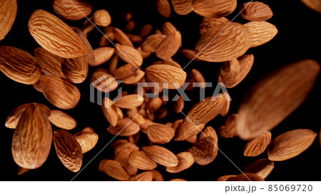 Freeze motion of flying whole almonds. Freeze motion of flying whole almonds. 85069720