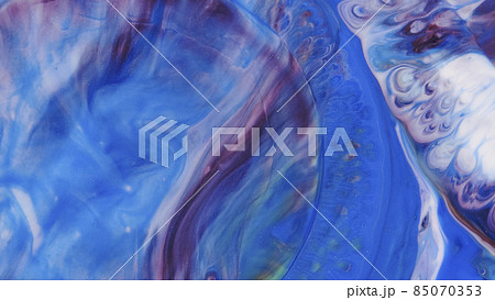 Blue streaks on a white background. Liquid abstractions. Abstract natural art. Blue streaks on a white background. Liquid abstractions. Abstract natural art. 85070353
