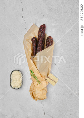 Overhead view of dried sausage made of venison and turkey meat Overhead view of dried sausage made of venison and turkey meat 85070802