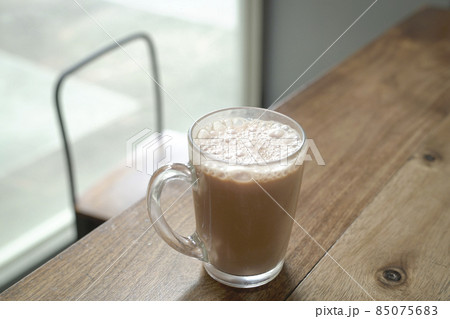 Milk tea on wood table. Milk tea on wood table. 85075683