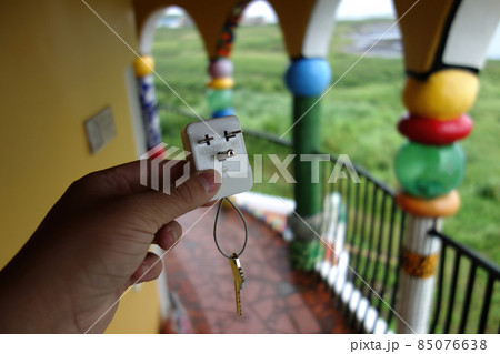 Close up shot of a wall plug with key in Penghu island Close up shot of a wall plug with key in Penghu island 85076638