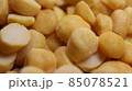 Yellow chickpea lentils seeds macro closeup view 85078521