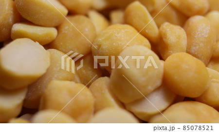 Yellow chickpea lentils seeds macro closeup view Yellow chickpea lentils seeds macro closeup view 85078521