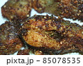 Spicy and crunchy barbecue of fried fish fillet on a white background 85078535