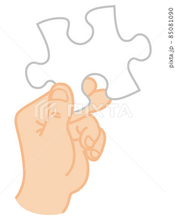 パズルの1ピースを持つ手のイラスト素材