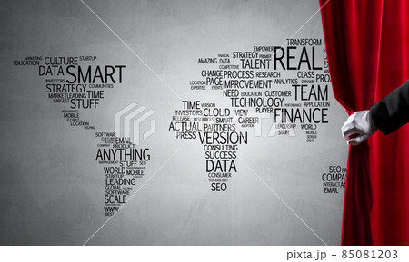 World map behind drapery curtain and hand opening it World map behind drapery curtain and hand opening it 85081203