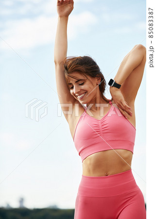 Young beautiful woman with a slim figure goes in for sports at beach. Fitness, sport and healthy lifestyle concept. 85083387