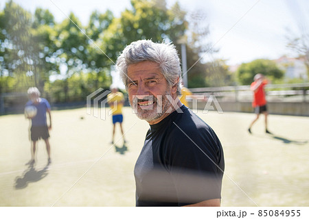 Smiling senior goalkeeper ready for match Smiling senior goalkeeper ready for match 85084955