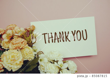Thank You typography text with flowers on pink background Thank You typography text with flowers on pink background 85087815