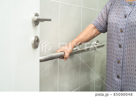 Asian senior or elderly old lady woman patient use toilet bathroom handle security in nursing hospital ward, healthy strong medical concept. Asian senior or elderly old lady woman patient use toilet bathroom handle security in nursing hospital ward, healthy strong medical concept. 85090048