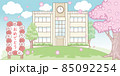 桜の木と小学校の建物の背景イラスト　日本語で「おめでとう」と書いてある 85092254