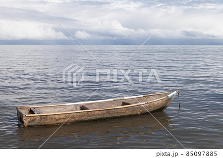 Old wooder boat is anchored at Samana bay 85097885