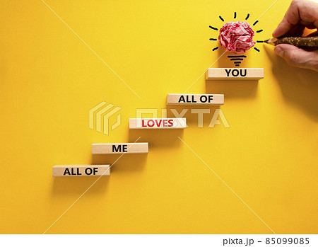 All of me loves all of you symbol. Wooden blocks with words All of me loves all of you on beautiful yellow background, copy space. Businessman hand, light bulb icon. Lifestyle, love concept. All of me loves all of you symbol. Wooden blocks with words All of me loves all of you on beautiful yellow background, copy space. Businessman hand, light bulb icon. Lifestyle, love concept. 85099085