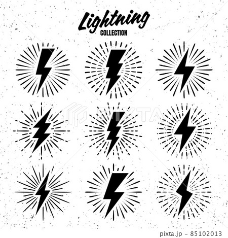 Set of vintage lightning bolts and sunrays on grunge background. Lightnings with sunburst effect 85102013