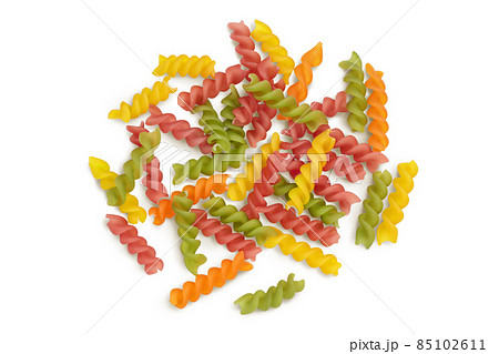 raw Fusilli colored pasta, isolated on white background with clipping path and full depth of field. Top view. Flat lay raw Fusilli colored pasta, isolated on white background with clipping path and full depth of field. Top view. Flat lay 85102611