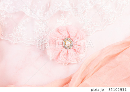 Pink lace flower with a pearl Pink lace flower with a pearl 85102951