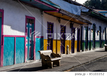 The beautiful Calle Real and facades of the houses of the small town of Salento located at the region of Quindio in Colombia 85103352