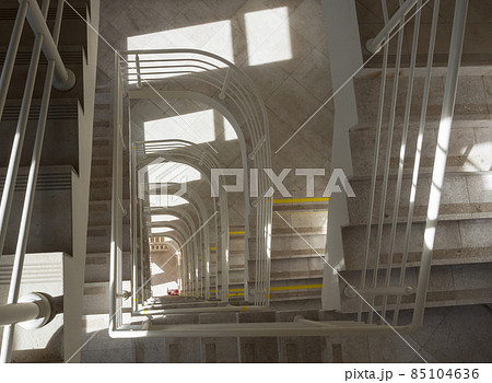 Top view of a staircase with a stream of light falling from the windows onto the landing Top view of a staircase with a stream of light falling from the windows onto the landing 85104636