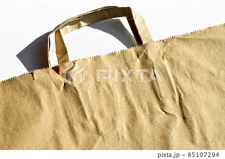 Recycled paper shopping one bag on white background Recycled paper shopping one bag on white background 85107294