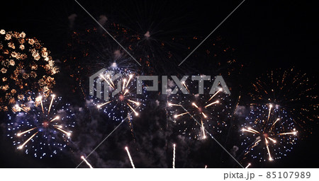 Colorful vibrant Firework celebrate anniversary happy new year 2022, 4th of july holiday festival. colorful firework in the night time to celebrate national holiday. countdown new year 2022 party time 85107989
