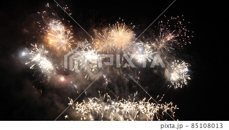 Golden Firework celebrate anniversary happy new year 2022, 4th of july holiday festival. Gold firework in the night time celebrate national holiday. Countdown to new year 2022 gold party time event 85108013