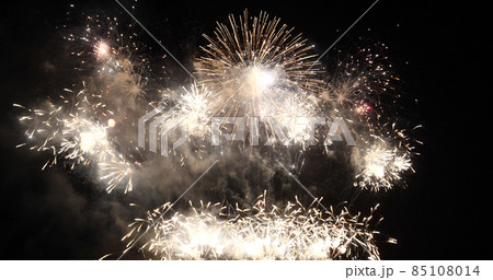 Golden Firework celebrate anniversary happy new year 2022, 4th of july holiday festival. Gold firework in the night time celebrate national holiday. Countdown to new year 2022 gold party time event 85108014