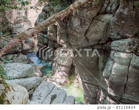 Steep smooth relief canyons with a river flowing into their gorge. Magnificent nature Steep smooth relief canyons with a river flowing into their gorge. Magnificent nature 85110834